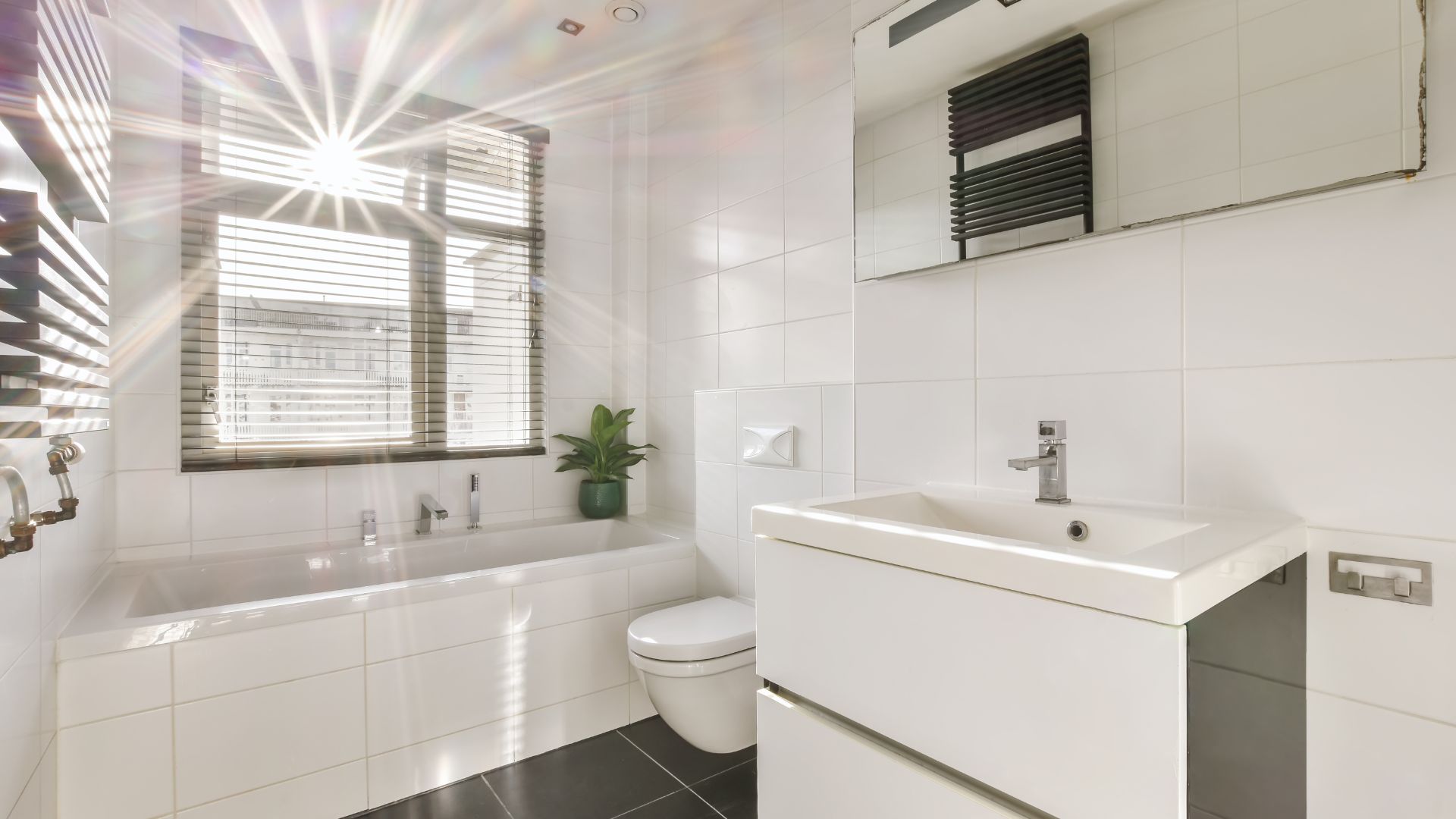 A bathroom with a sink, toilet and bathtub