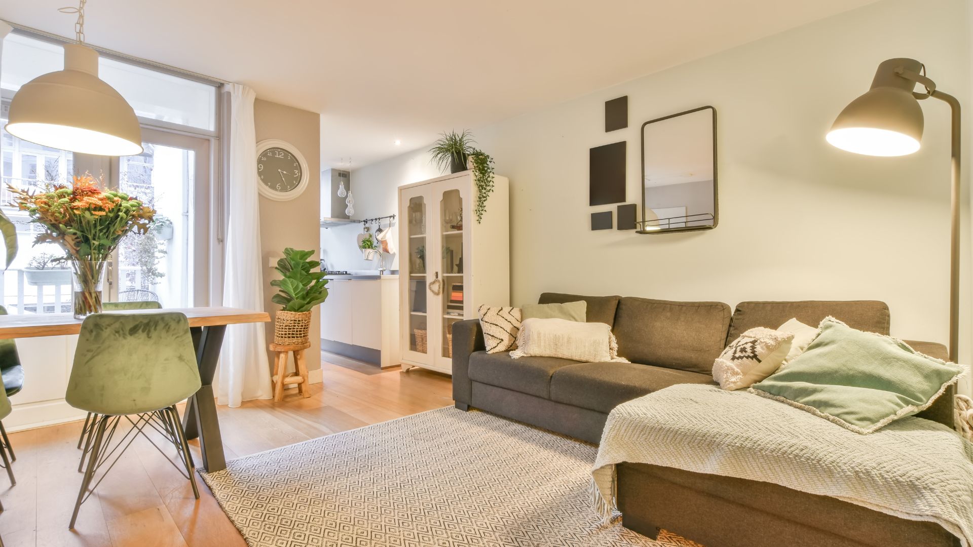 A living room filled with furniture and a table